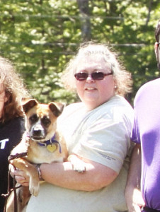 Kasey posing with one of her student dogs while at CATCH University at St. Hubert's.